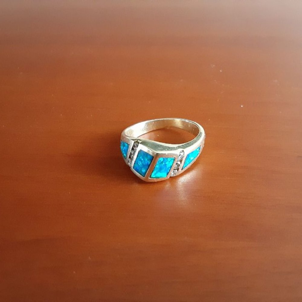 Ladies opal and diamond ring